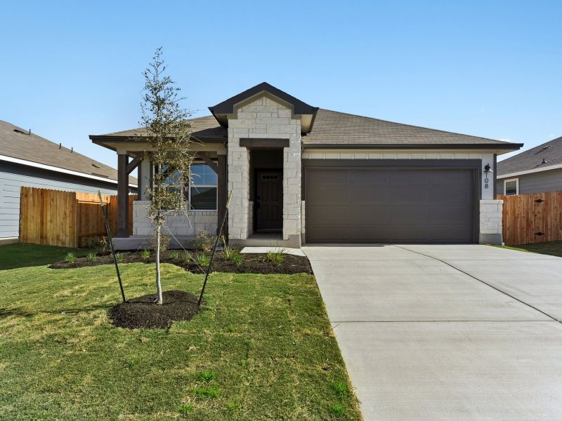 Front exterior of a new home in Eastern Wells, Jarrell, TX, highlighting curb appeal (Image 1). Front exterior of a new home in Eastern Wells, Jarrell, TX, highlighting curb appeal (Image 1).