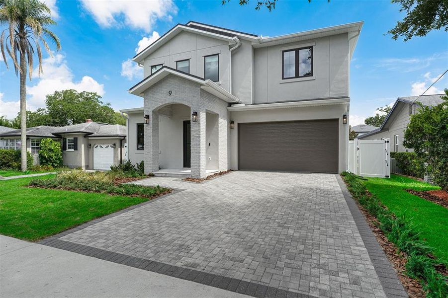 Front exterior of a new home in , Orlando, FL, highlighting curb appeal (Image 25).