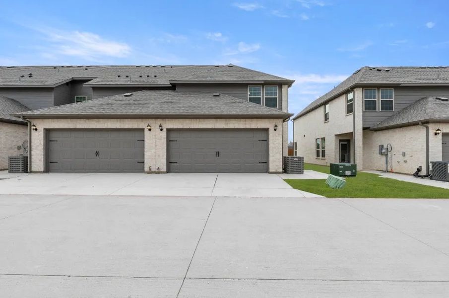 Front exterior of a new home in Sanger Circle, Sanger, TX, highlighting curb appeal (Image 16).