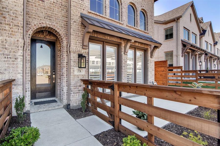 Front exterior of a new home in , Sherman, TX, highlighting curb appeal (Image 2).