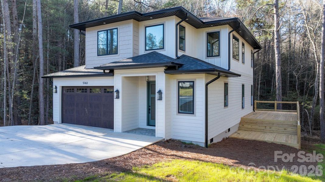 Front exterior of a new home in , Granite Falls, NC, highlighting curb appeal (Image 20).
