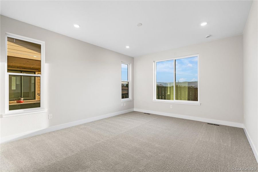 Spacious, unfurnished interior of a new home in Stargaze at Solstice, Littleton (Image 35).