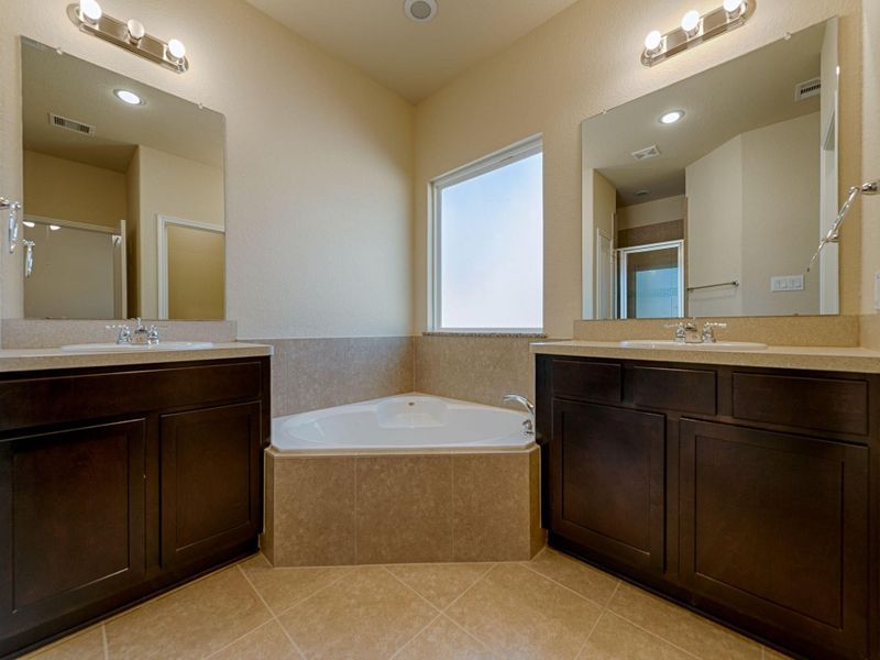 Master Bath with Double Vanities, Tub and Separate Shower. Representation Photos of the Maverick Plan. Actual Colors and Selections May Vary! Master Bath with Double Vanities, Tub and Separate Shower. Representation Photos of the Maverick Plan. Actual Colors and Selections May Vary!