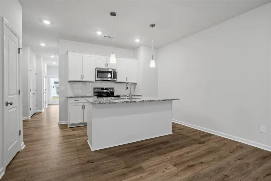 Furnished interior view inside a new home in Renaissance at White Oak, Garner (Image 4).
