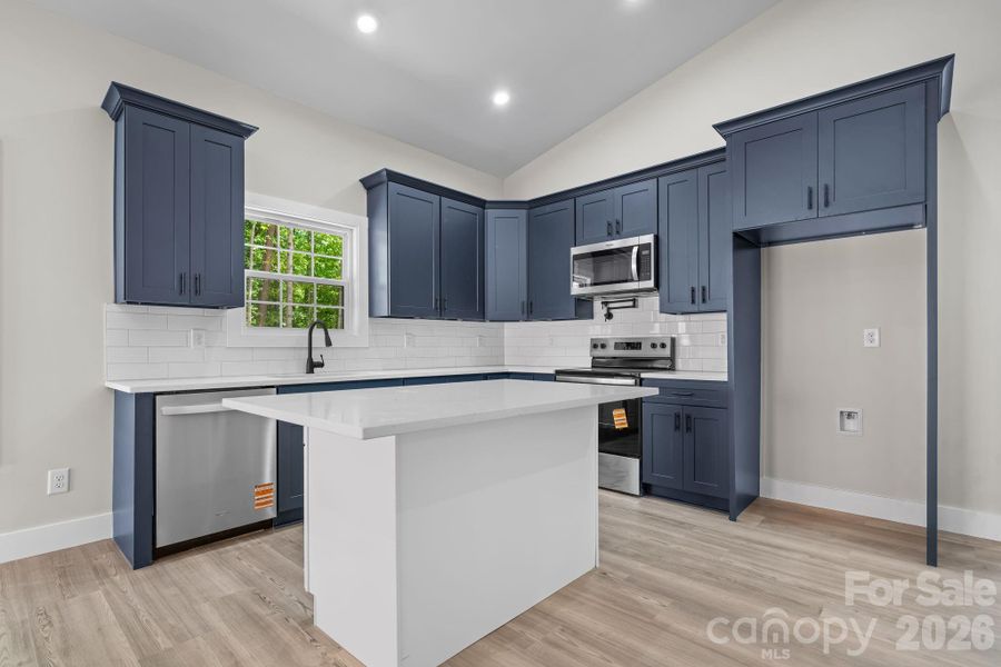 Furnished interior view inside a new home in , Lenoir (Image 8).