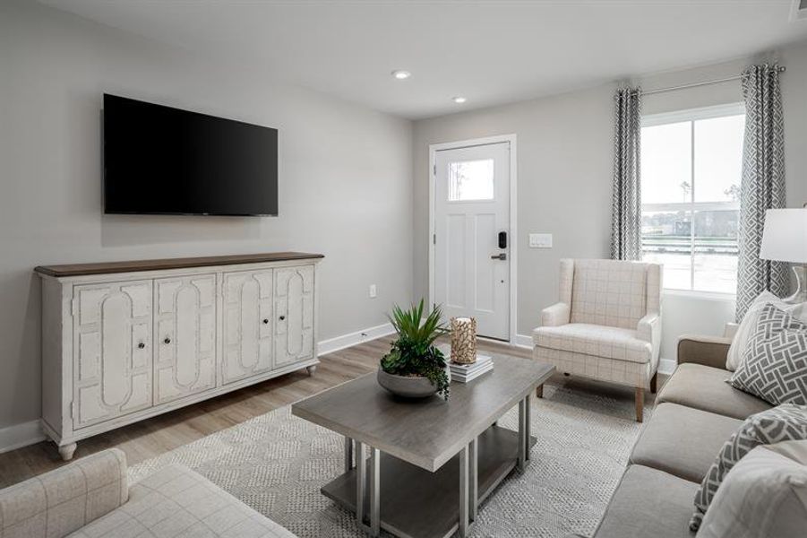 Representative furnished interior of a home built from the Nassau Cove Quick Move-In by Ryan Homes in Anderson Farm, Calabash (Image 4).