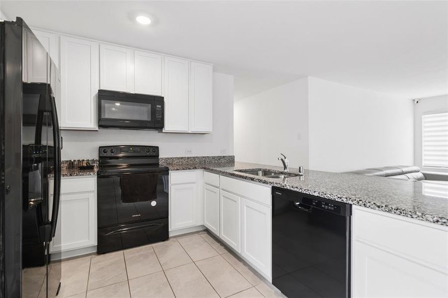 Furnished interior view inside a new home in Tillage Farms, Princeton (Image 12).