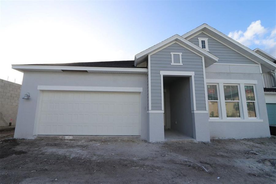 In-progress construction of a new home in Emerald Landing at Waterside at Lakewood Ranch – Lake Series, Sarasota, FL (Image 6).