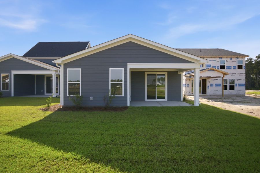 Exterior details and patio area of a home in Terrapin, Leland (Image 15).