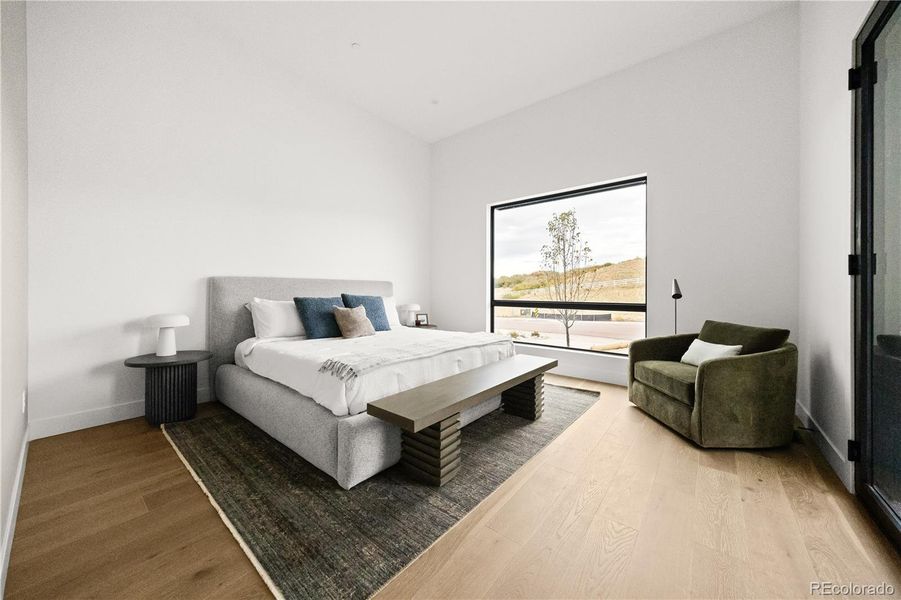 Furnished interior view inside a new home in Signature at Crystal Valley, Castle Rock (Image 33).