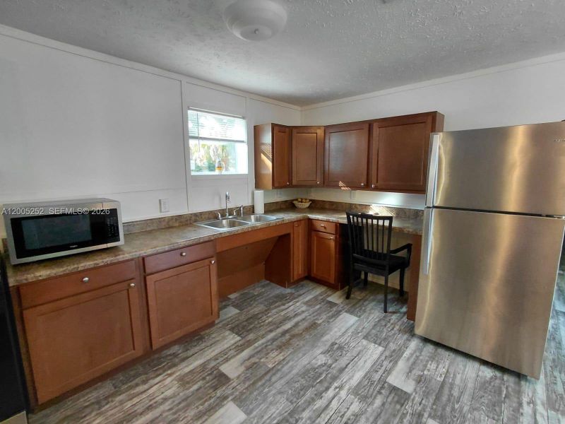 Furnished interior view inside a new home in , Clewiston (Image 5).