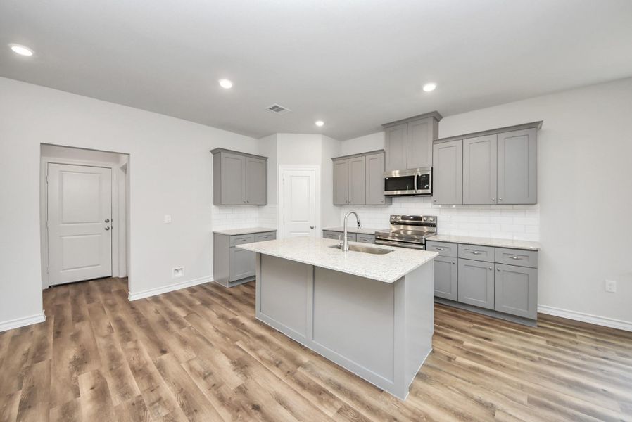 Furnished interior view inside a new home in The Enclave at Spring Branch, Conroe (Image 8).