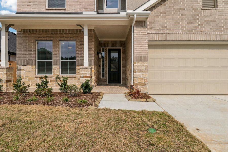 Exterior details and patio area of a home in The Highlands, Porter (Image 25).