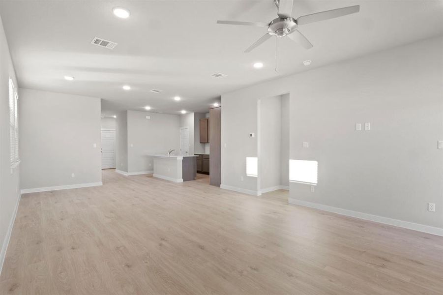 Living Room in the Willow home plan by Trophy Signature Homes – REPRESENTATIVE PHOTO Living Room in the Willow home plan by Trophy Signature Homes – REPRESENTATIVE PHOTO