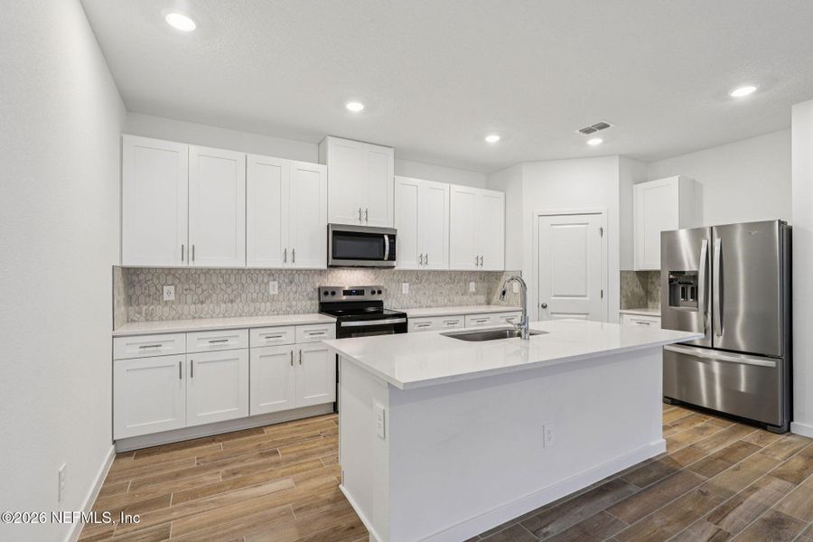 Furnished interior view inside a new home in Colbert Landings, Palm Coast (Image 6).