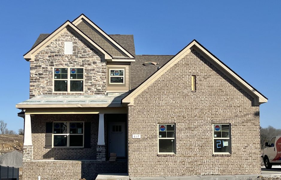 This is going to be a great looking house! All we need are more shutters, the front columns to get painted and full yard sod and landscaping.