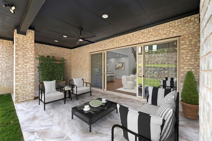 Virtually staged covered back patio with gas stub out for an outdoor kitchen.  Backyard faces East making for an expansive shaded area in the afternoons!