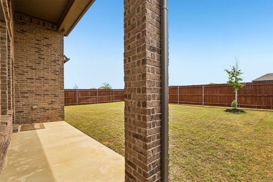 Exterior details and patio area of a home in Silverado, Aubrey (Image 3).