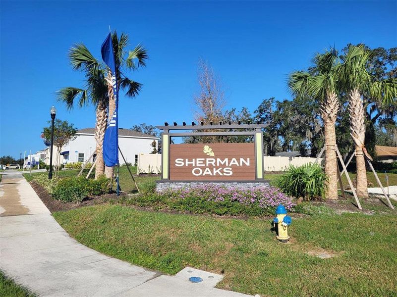 Front exterior of a new home in Sherman Oaks, Brooksville, FL, highlighting curb appeal (Image 2).