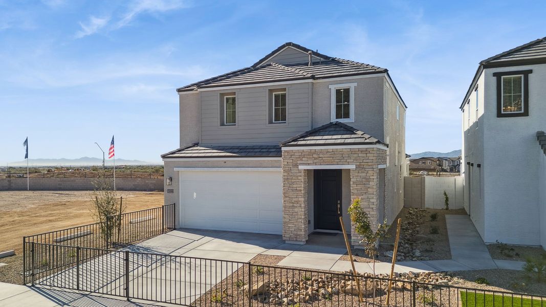 Representative exterior photo of a completed home built from the Mirage by D.R. Horton in The Buttes at Mystic, Peoria, AZ (Image 30).