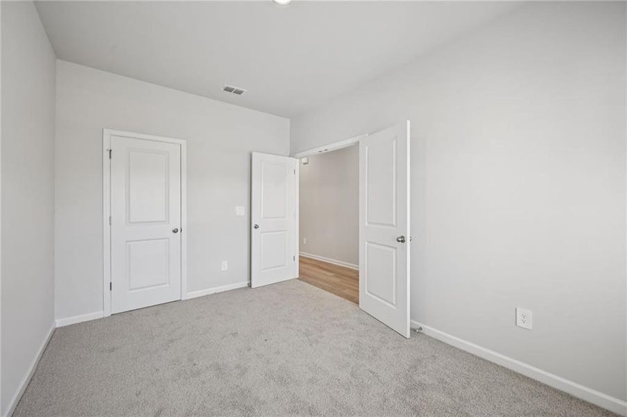Spacious, unfurnished interior of a new home in Creekside at Oxford Park, Fairburn (Image 35).
