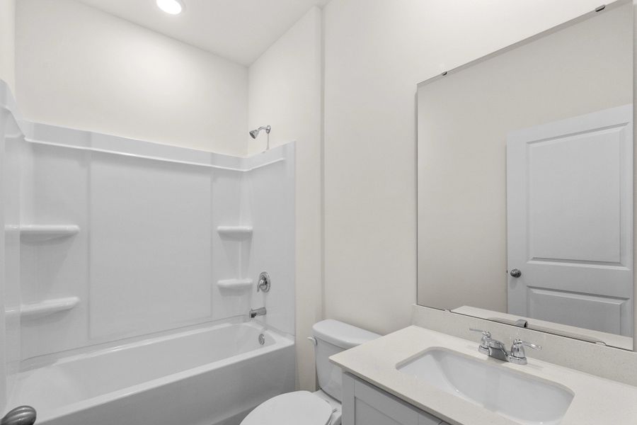 Representative furnished interior of a home built from the Highland by Starlight Homes in Sutton Farms, San Antonio (Image 12).