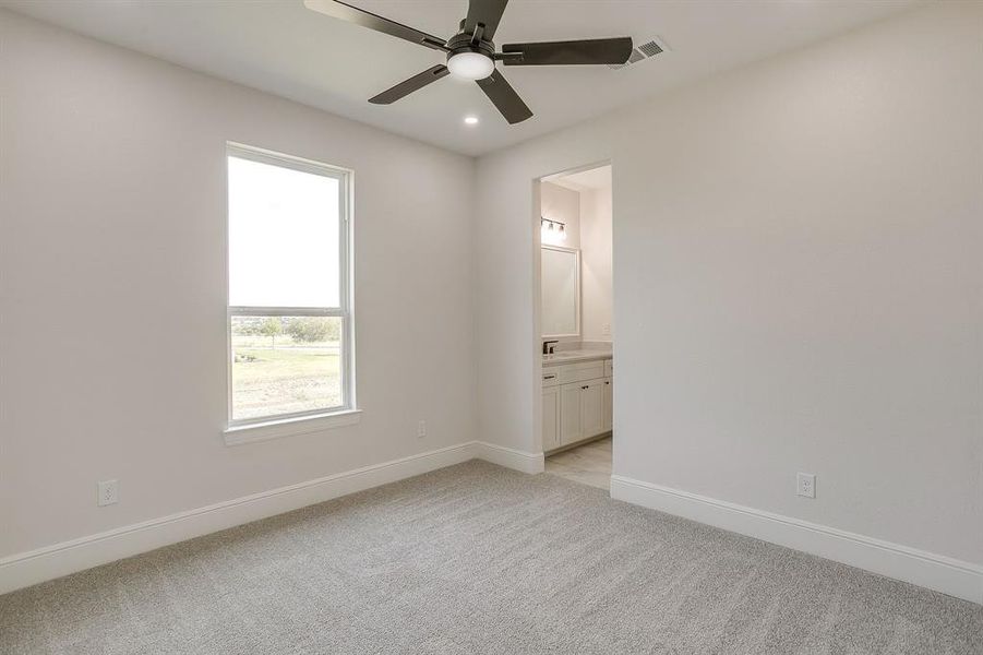 BEDROOM 3 with adjoining jack and Jill bathroom.