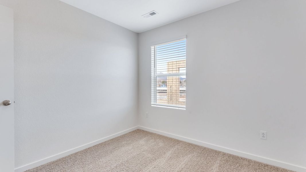 Representative unfurnished interior of a home built from the Juniper by D.R. Horton in Ellston Park, Colorado Springs (Image 32).