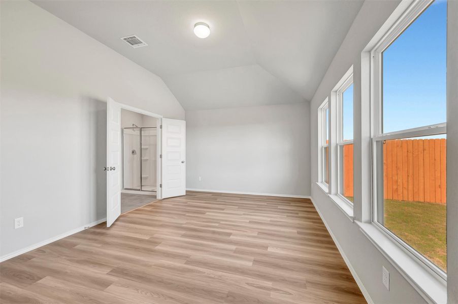 Spacious, unfurnished interior of a new home in Carillon, Manor (Image 27).