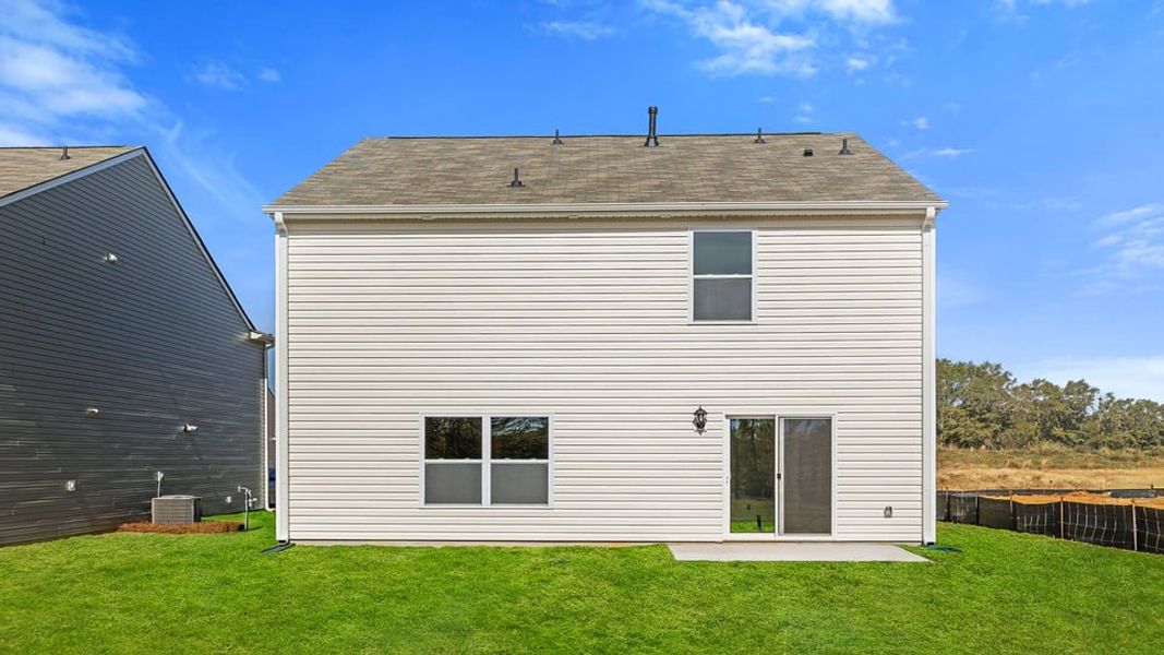 Exterior details and patio area of a home in Durbin Meadows, Fountain Inn (Image 2). Exterior details and patio area of a home in Durbin Meadows, Fountain Inn (Image 2).