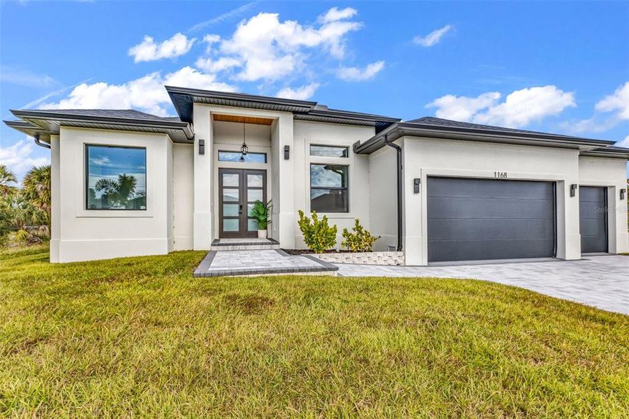 Front exterior of a new home in , Rotonda West, FL, highlighting curb appeal (Image 26). Front exterior of a new home in , Rotonda West, FL, highlighting curb appeal (Image 26).
