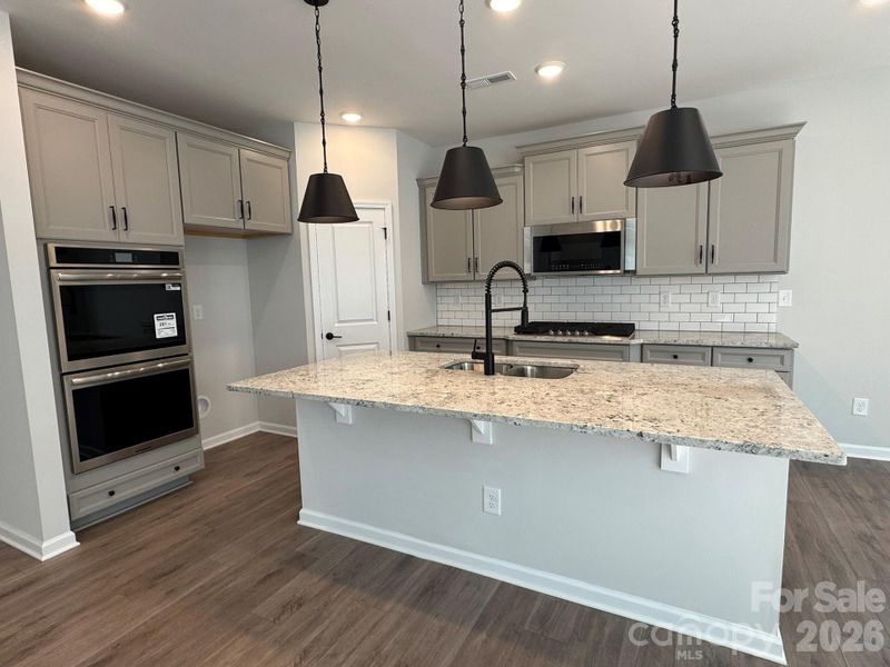 Kitchen with pendant lighting over the island Kitchen with pendant lighting over the island