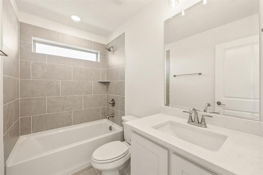 Furnished interior view inside a new home in Country Lakes, Denton (Image 13).