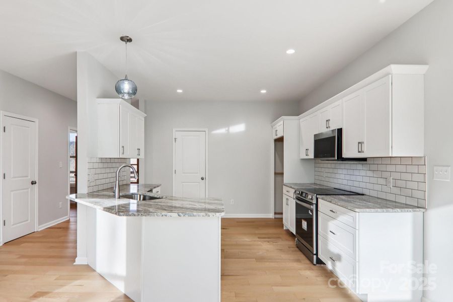 Furnished interior view inside a new home in , Candler (Image 13).