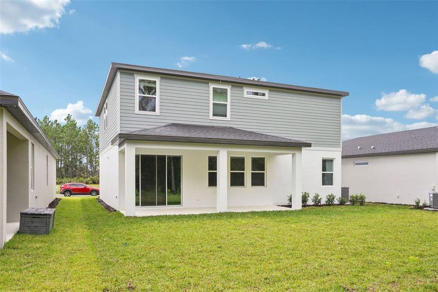 Exterior details and patio area of a home in , Ormond Beach (Image 25).