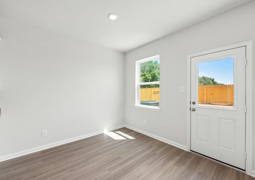 Enjoy family meals in this spacious dining room.