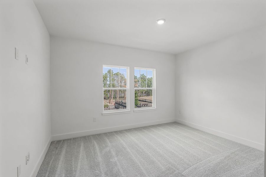 Representative unfurnished interior of a home built from the Newton by Rockwell Homes in Harvest at Ovation - Townhomes, Winter Garden (Image 68). Representative unfurnished interior of a home built from the Newton by Rockwell Homes in Harvest at Ovation - Townhomes, Winter Garden (Image 68).