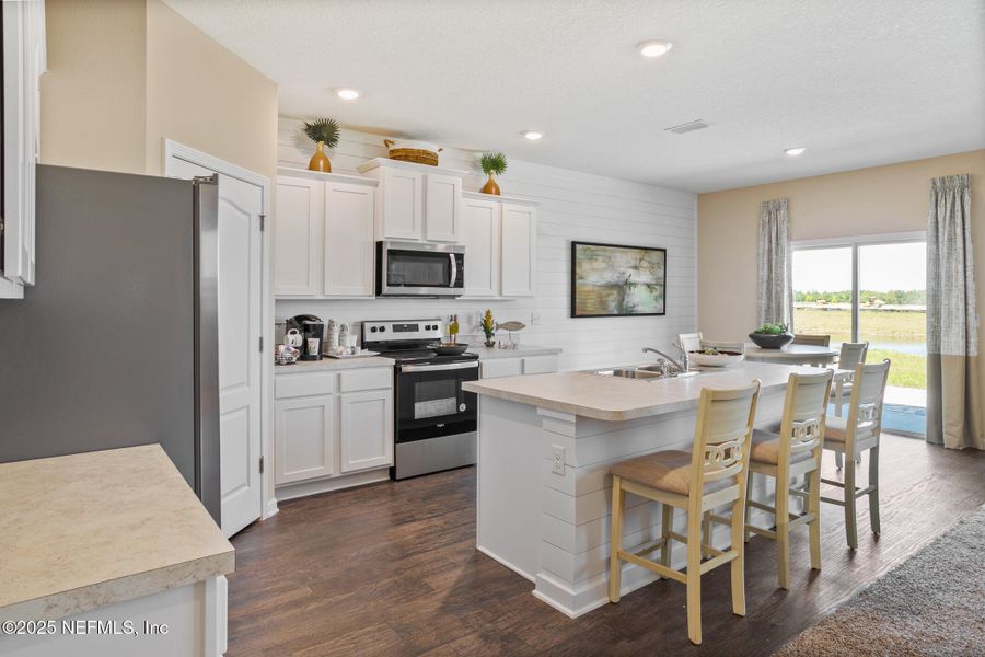 Furnished interior view inside a new home in Sawmill Branch, Palm Coast (Image 10).