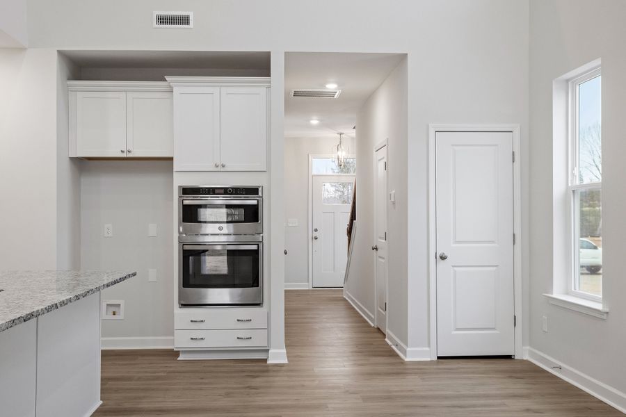 Furnished interior view inside a new home in Ovation at Sweetbrier, Durham (Image 8).