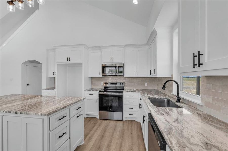 Furnished interior view inside a new home in , Elm Mott (Image 8).