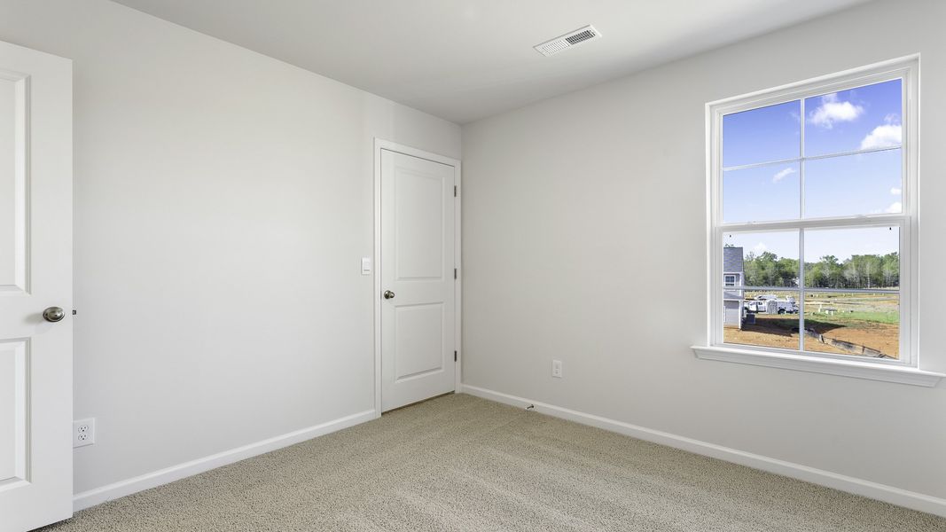 Spacious, unfurnished interior of a new home in Chandler Pointe, Rural Hall (Image 20).