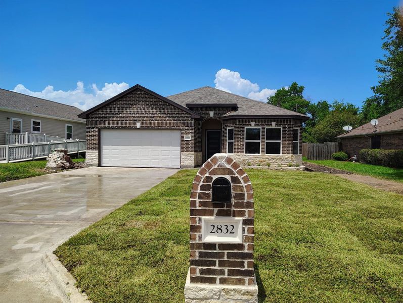 Front exterior of a new home in , La Marque, TX, highlighting curb appeal (Image 6).
