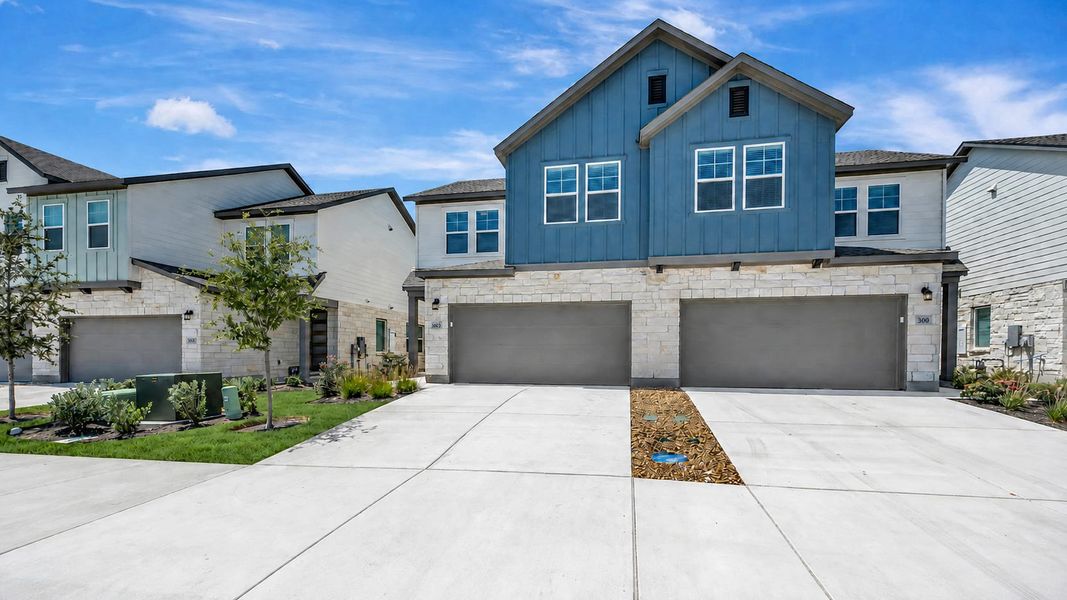 Front exterior of a new home in Park Central, Georgetown, TX, highlighting curb appeal (Image 29).