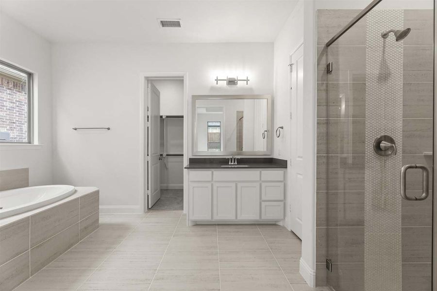 Representative furnished interior of a home built from the Brennan II by Pacesetter Homes in Nelson Lake, Rockwall (Image 12).