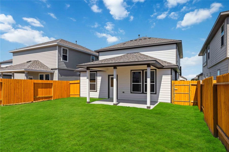 Exterior details and patio area of a home in Bluebonnet Village, Bellville (Image 20).