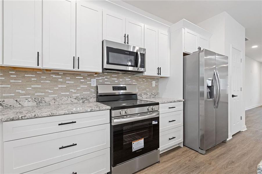 Furnished interior view inside a new home in , Lithonia (Image 9).