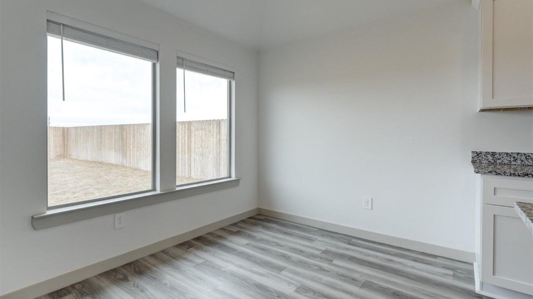 Representative unfurnished interior of a home built from the The Ashburn by D.R. Horton in Allen Farms, Lubbock (Image 16).