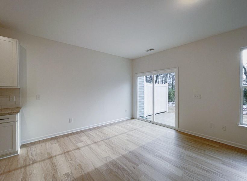 Spacious, unfurnished interior of a new home in East Main Townes, Spartanburg (Image 14).