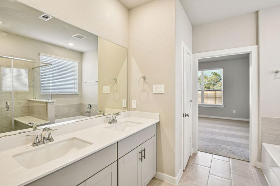 Furnished interior view inside a new home in Pine Lake Cove - Premier Series, Montgomery (Image 6).