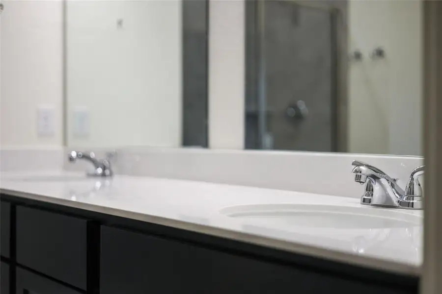 Bathroom featuring double vanity Bathroom featuring double vanity